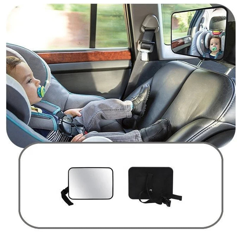 bébé dans son siége auto qui regarde dans le miroir